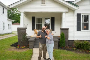 Alex Ferro and Client in Reidsville, NC celebrating the success of the retail buyer program assisting in remodeling and then selling