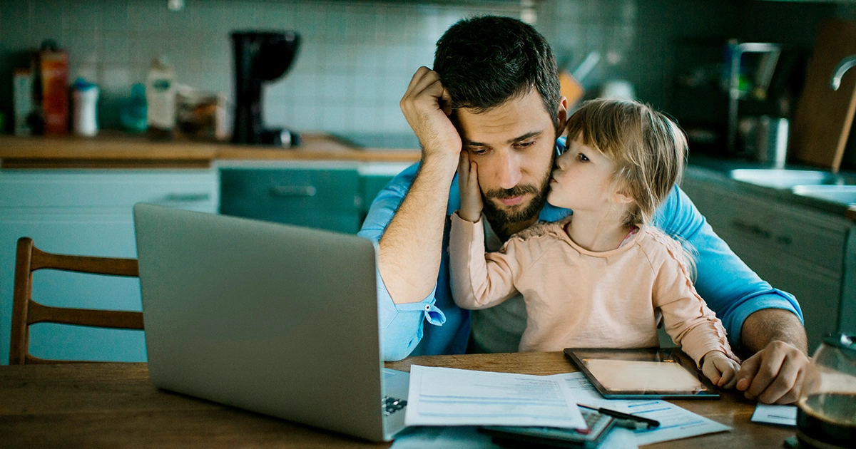 Concerned homeowner reviewing foreclosure paperwork